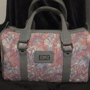 Amelia Earhart Woman’s pink & grey Floral zip closure Satchel Luggage travel bag